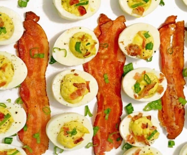 A bunch of different types of food on a plate, with Boiled egg