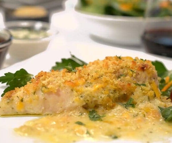 A plate of food on a table, with Chicken breast