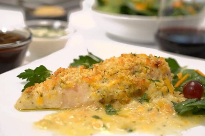 A plate of food on a table, with Chicken breast