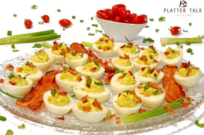 A plate of food on a table, with Egg and Bacon