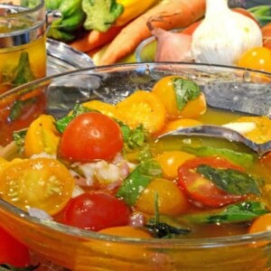 A bowl of marinated tomatoes