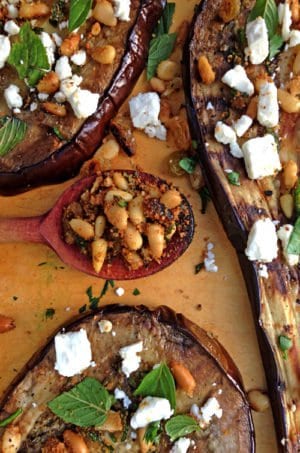 A wooden spoon and roasted eggplant