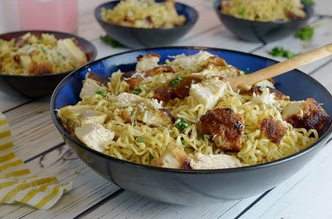 four bowls of ramen noodles with crispty chicken.