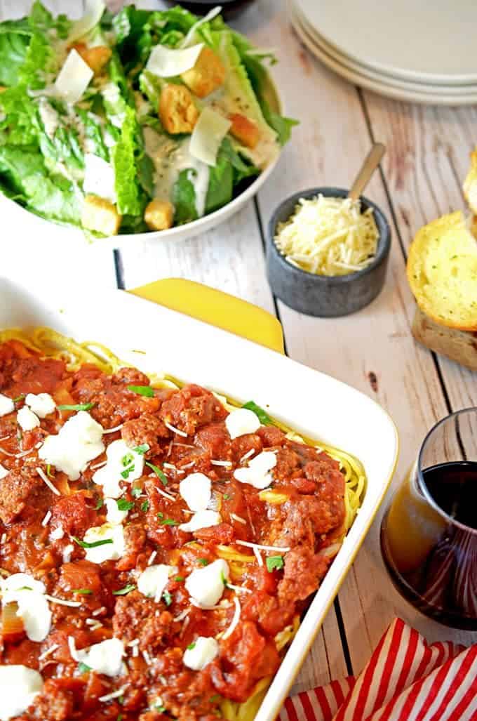 A plate of food on a table, with Spaghetti and Platter