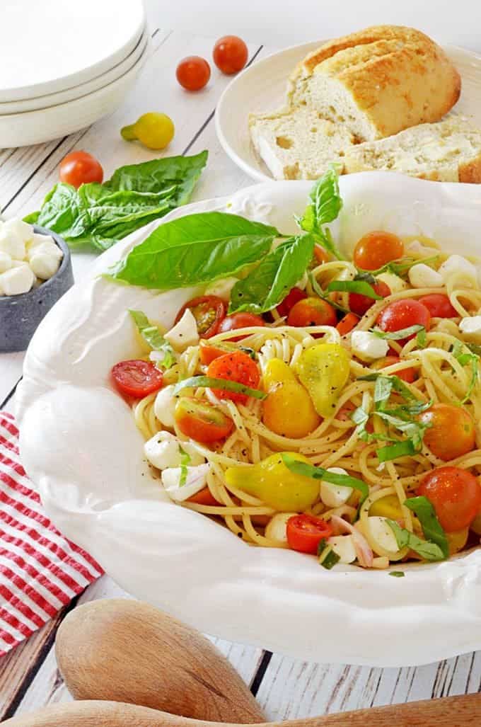 A large bowl of food with noodles