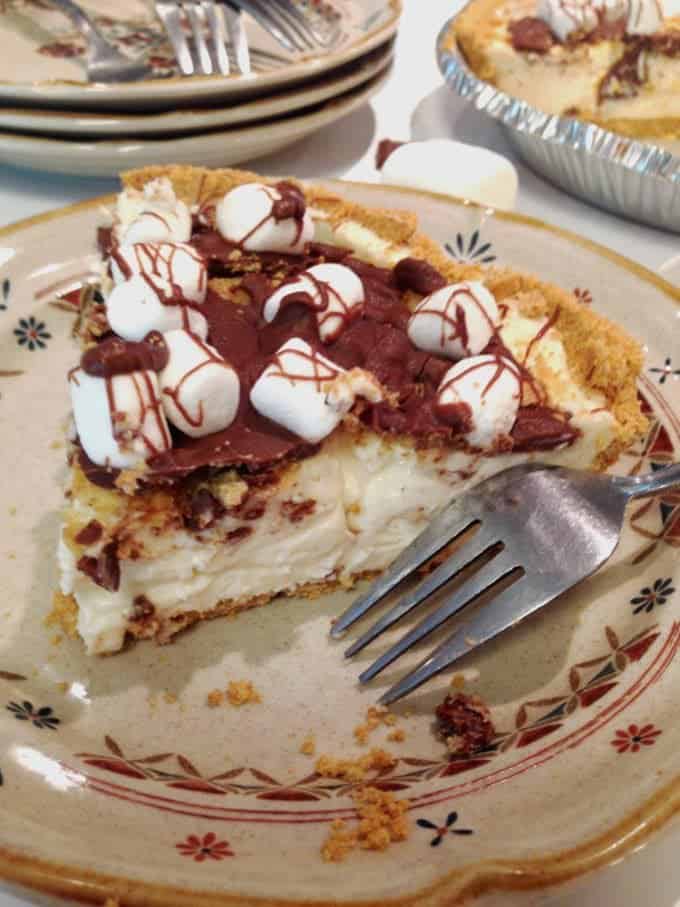 A plate of pie with a fork