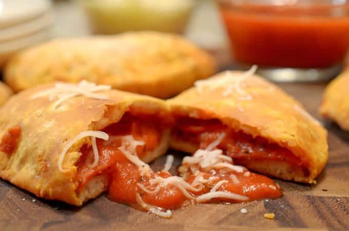 A close up of a slice of calzone