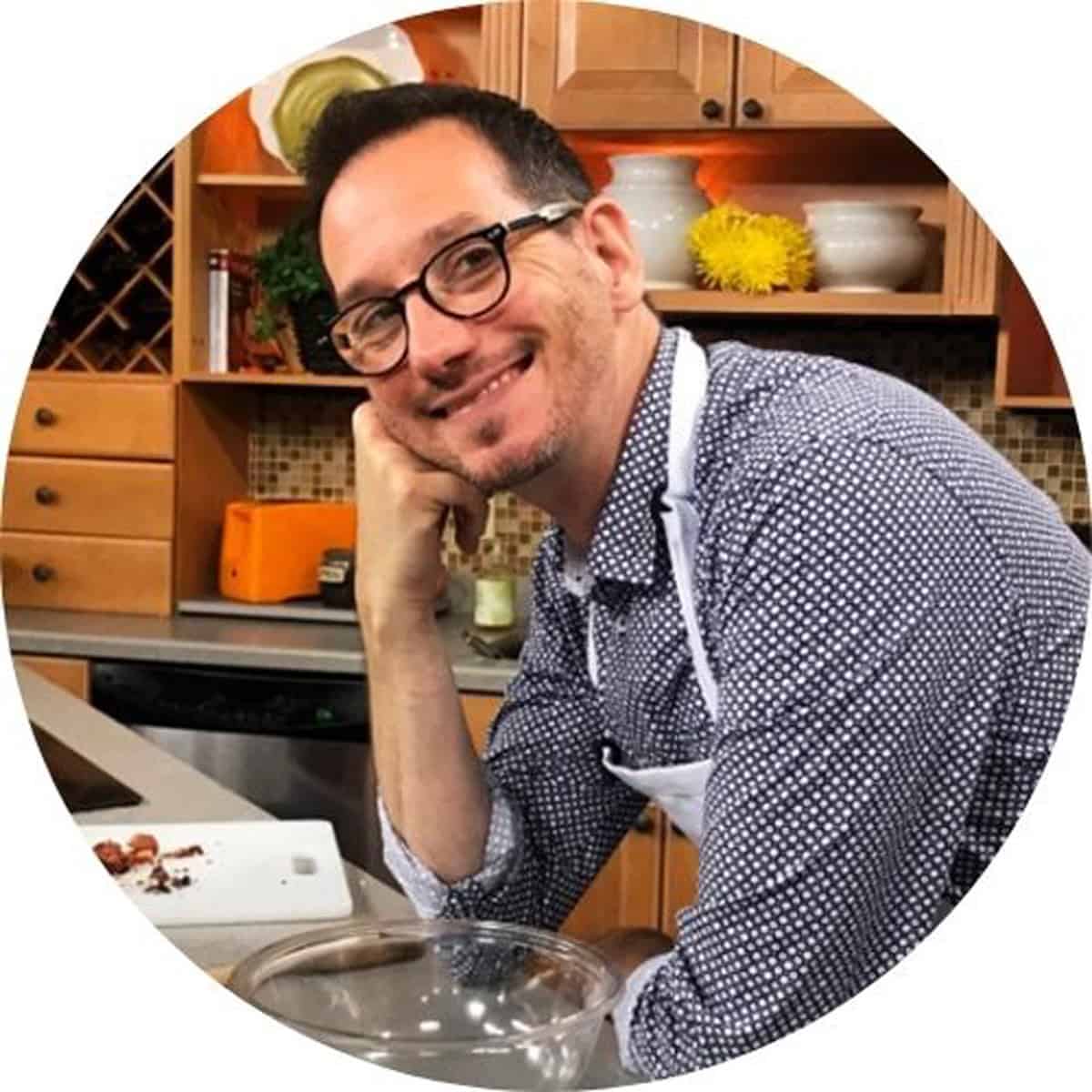 A man in a kitchen.