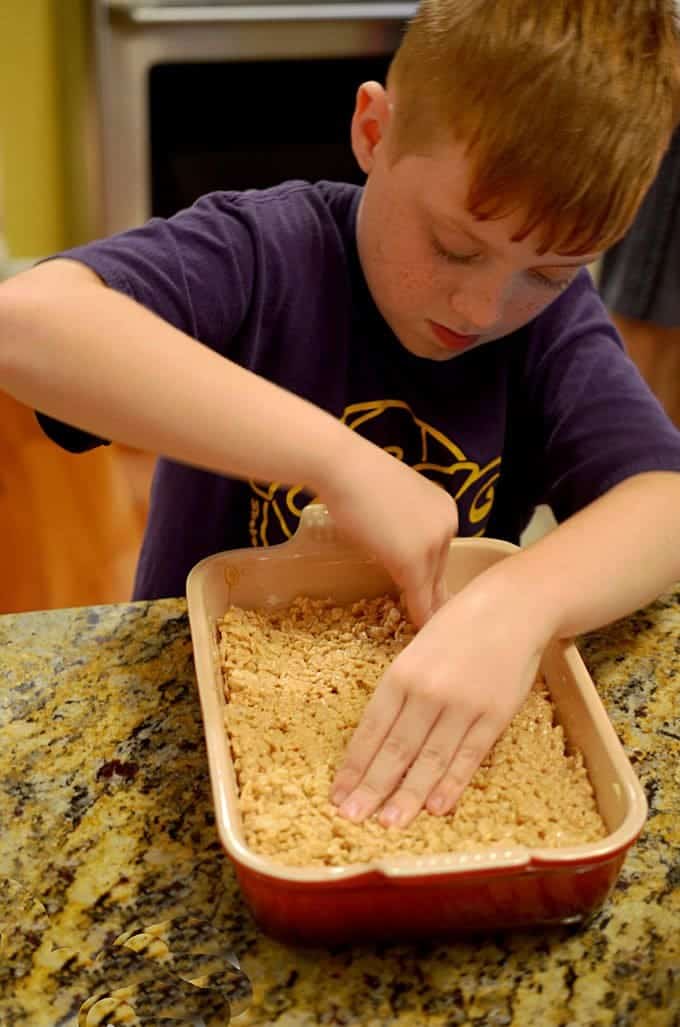 Boy making dessert bars