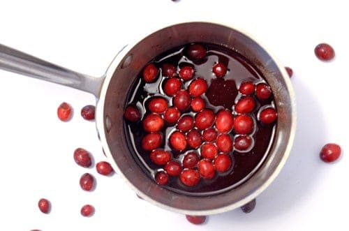 Saucepan containing Cranberries in liquid