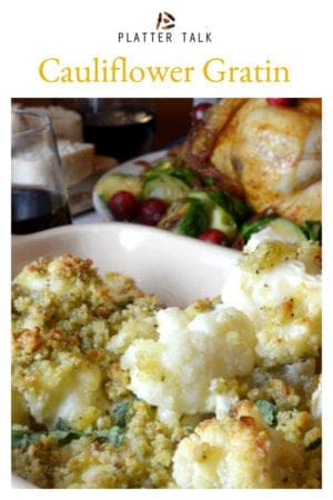 A plate of food with rice and vegetables, with Cauliflower and Gratin