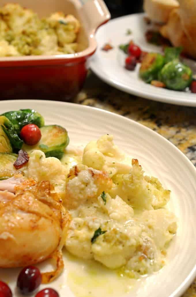 A plate of food on a table, with Cauliflower and Gratin