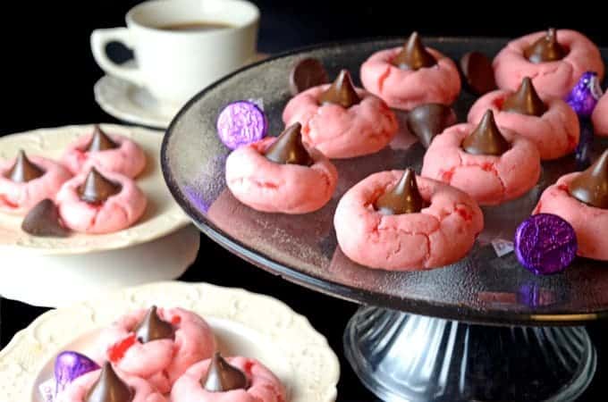 Serving platter and plate filled with Cherry Kiss cookies