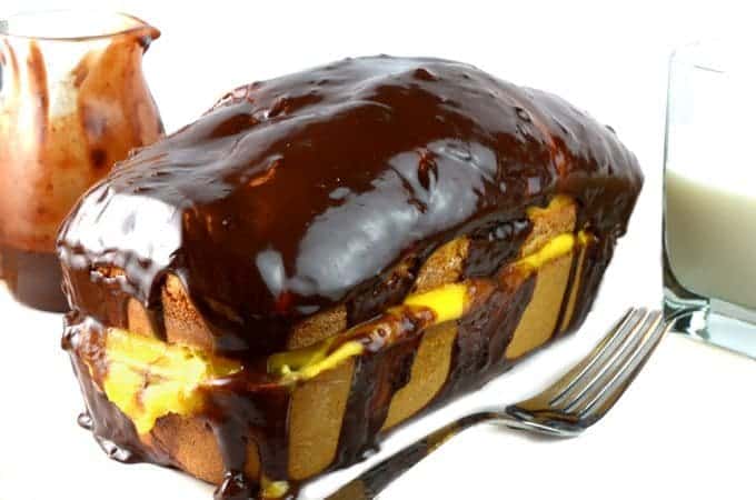 A loaf cake with chocolate frosting