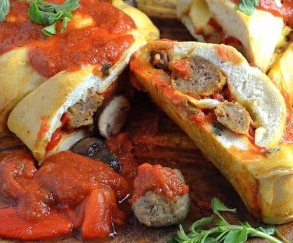 A close up of food, with Meatball and Stromboli