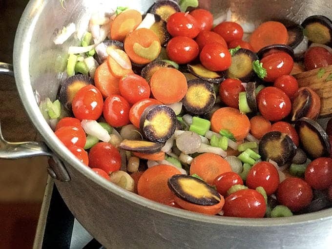 A pan of tomatoes and vegetables