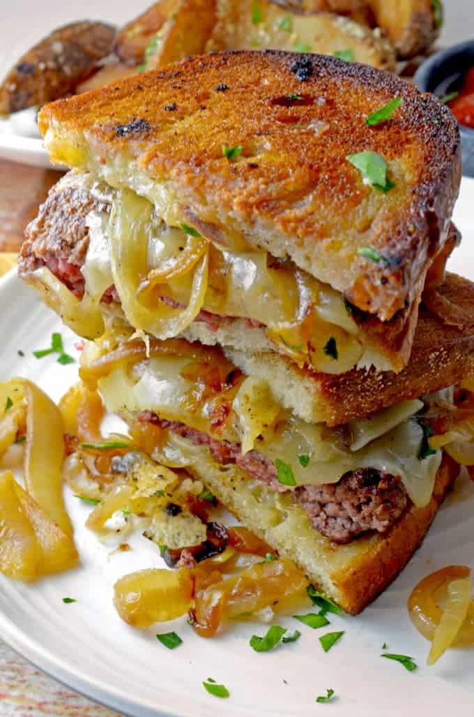 Ground beef & sweet caramelized onions, sandwiched between a toasted layer of rye bread and Swiss cheese all serve to make this Patty Melt the best of American food!