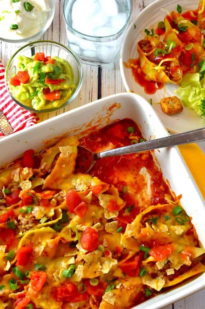 A pan of stuffed taco shells