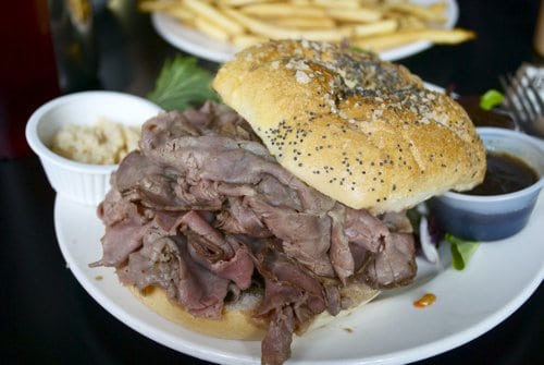 A close up Beef on weck on serving dish