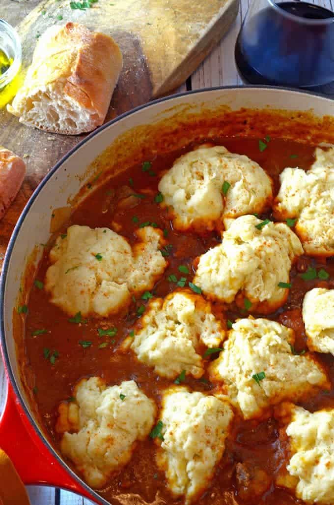 A pot of goulash with dumplings