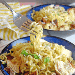 Bowl of ramen noodles with chicken.