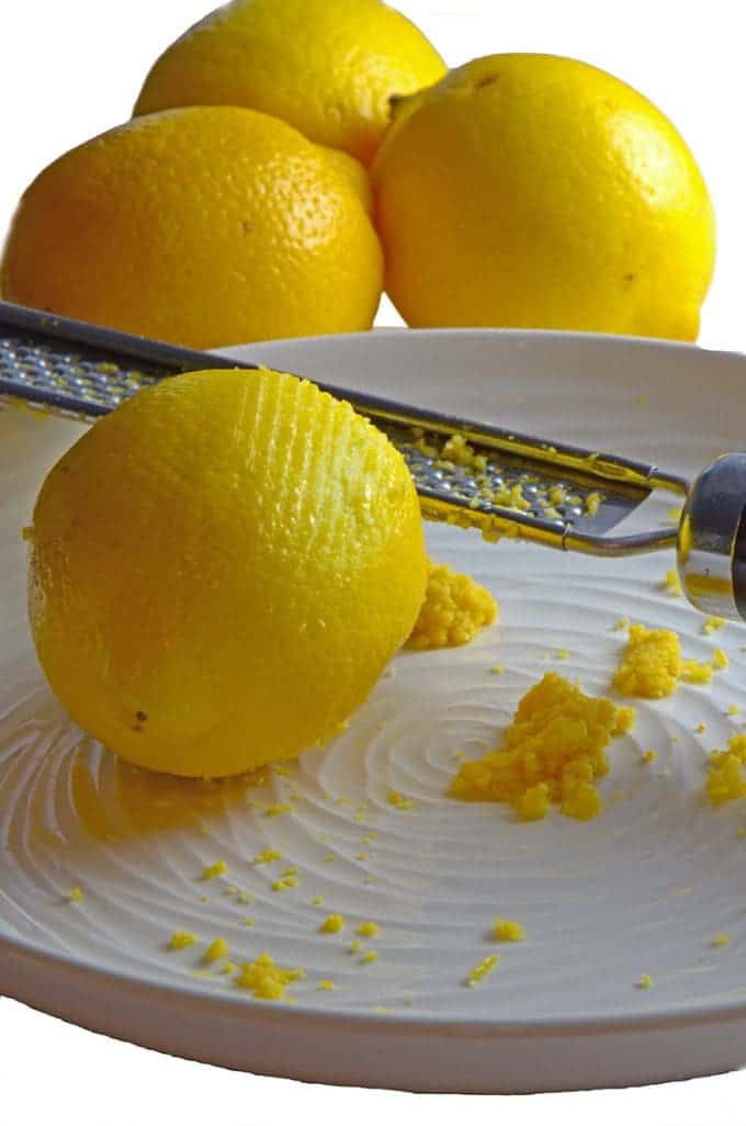 Plate of lemons being zested.