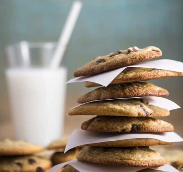 A bunch of cookies and milk