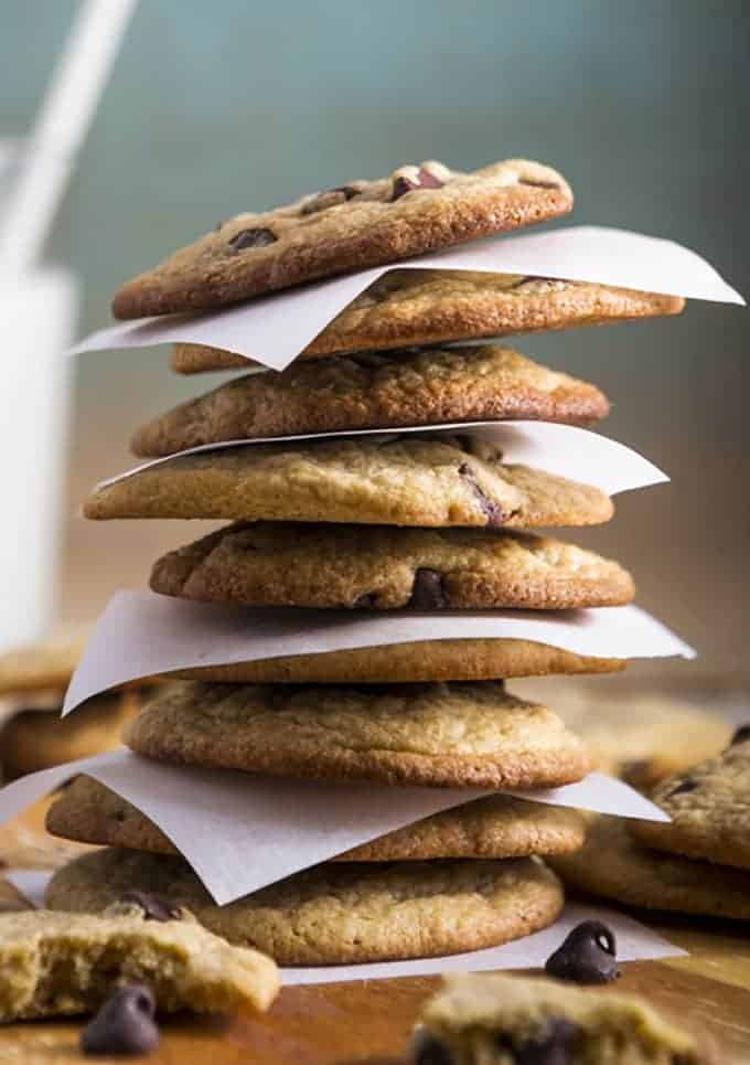 A tall stack of chocolate chip cookies