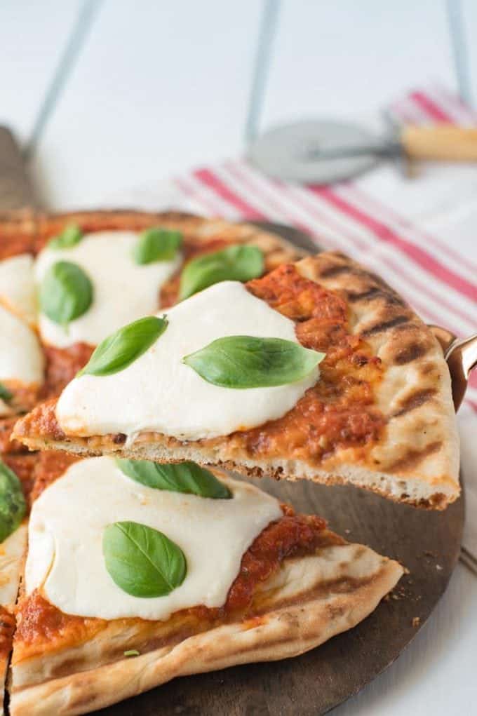 End of summer pizza party featuring margarita pizza on the grill.