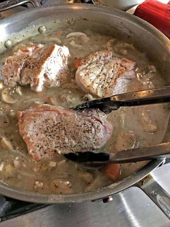 savory pork chops in skillet