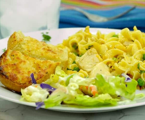 A plate of food on a table, with Casserole and Chicken