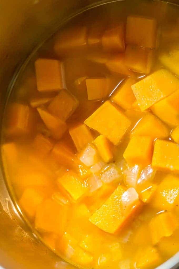 A pot of cut-up sweet potato