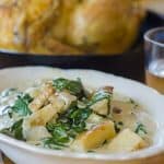 Serving dish of creqmed spinach and parsnips