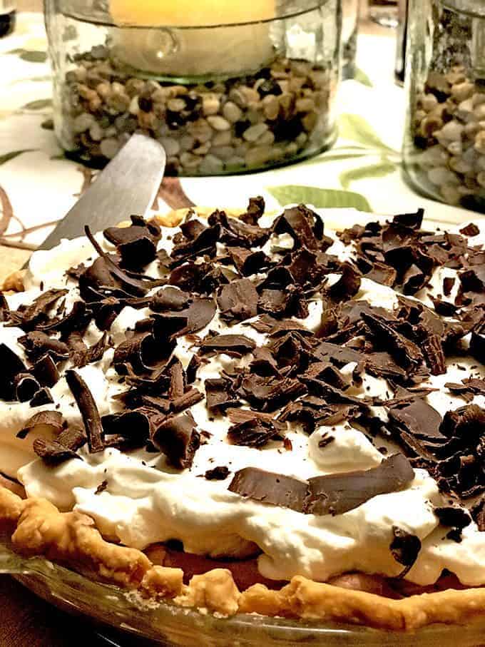 Chocolate cream pie with chocolate shavings and whipped cream on top