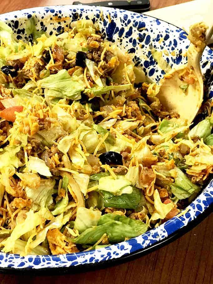 Close up dish of taco salad on table