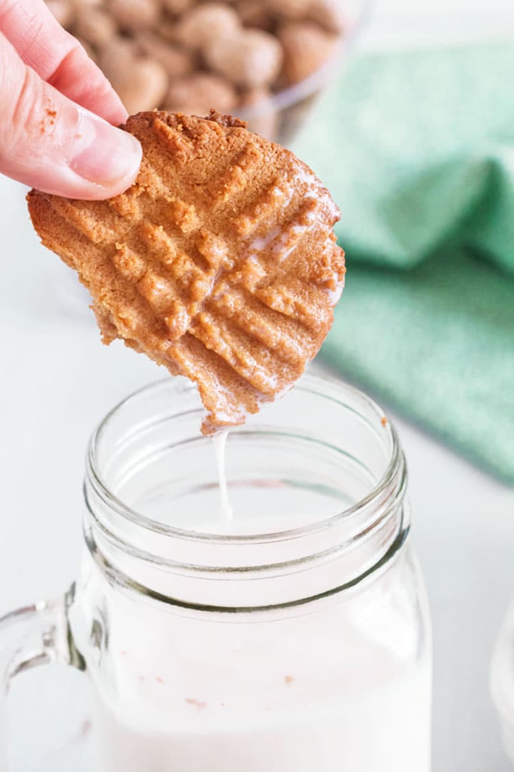 Dunking a 3-ingredient peanut butter cookie.