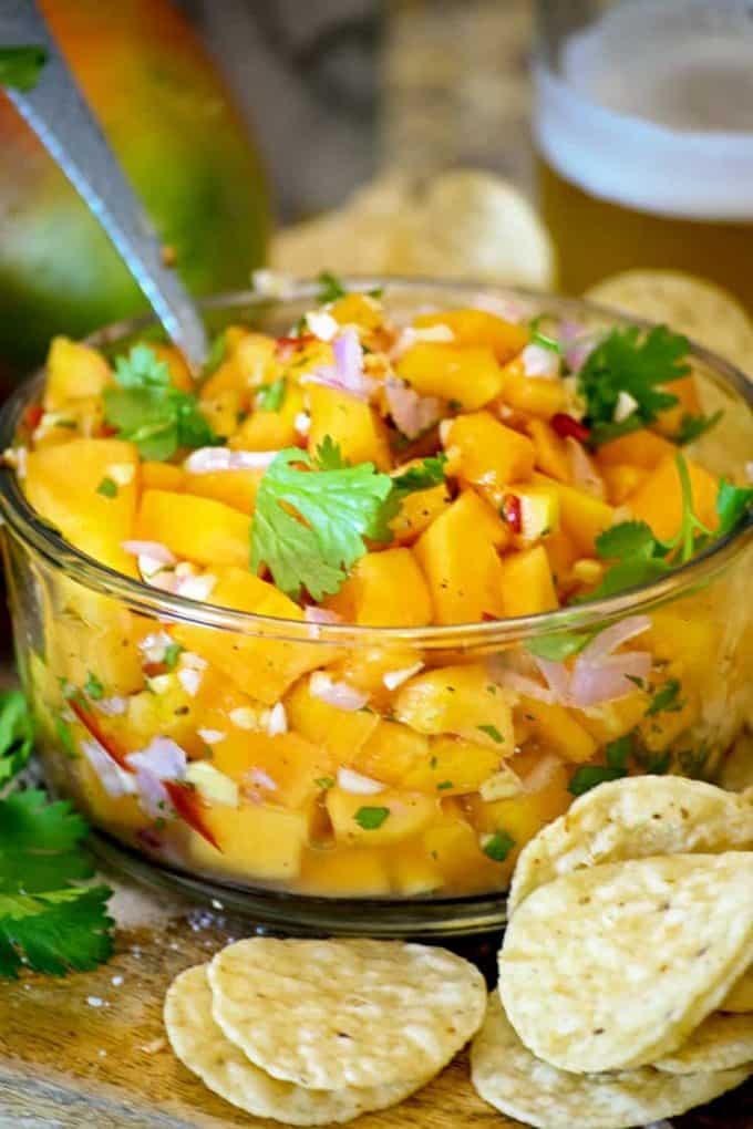 Fresh papaya salad in clear bowl close up