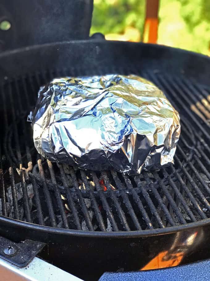 Roasting beets on a hot grill.