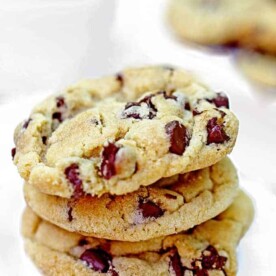 Chocolate chip cookies stacked on plate