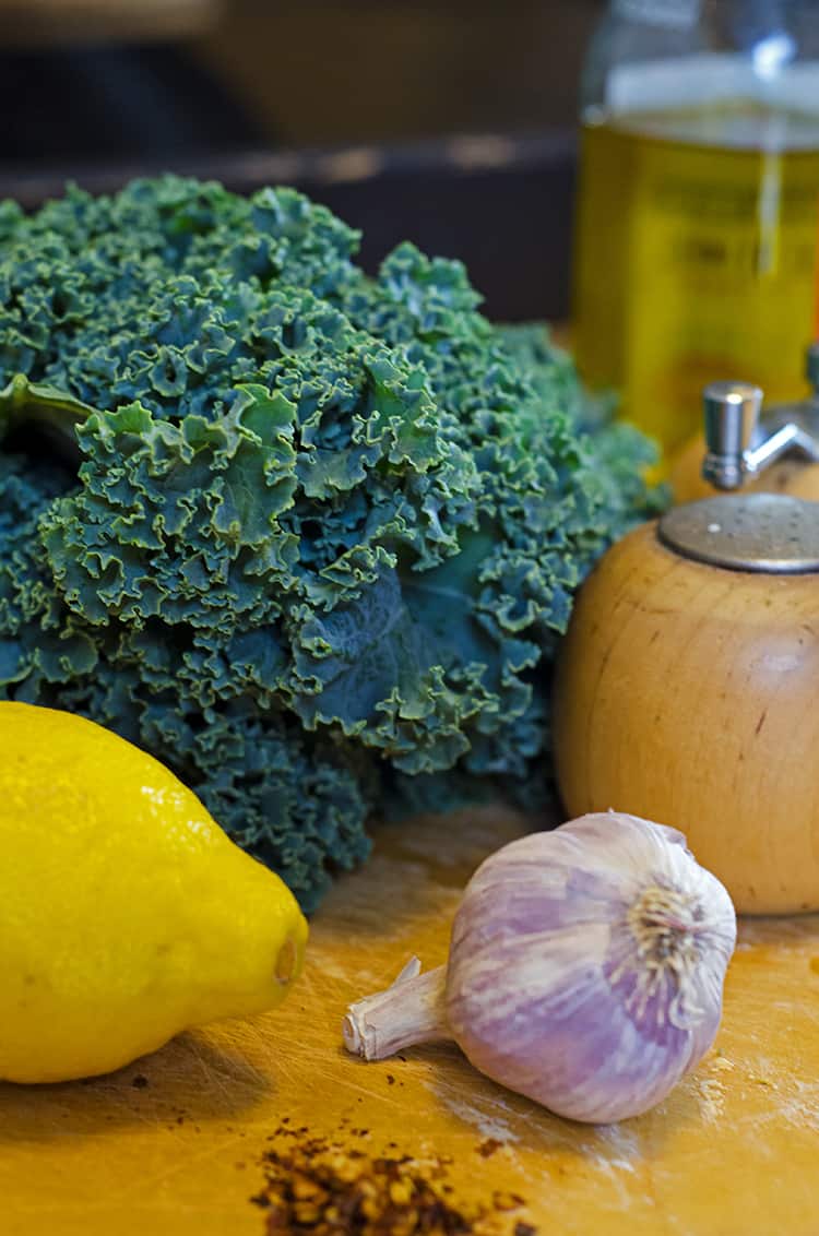 raw kale with lemon, garlic, pepper.