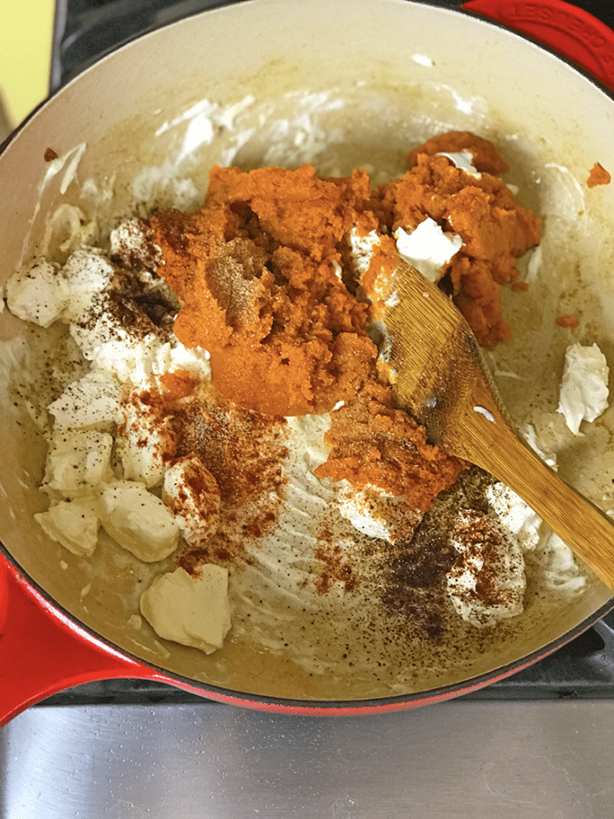 Making a pumking gnocchi sauce with pumpkin puree and