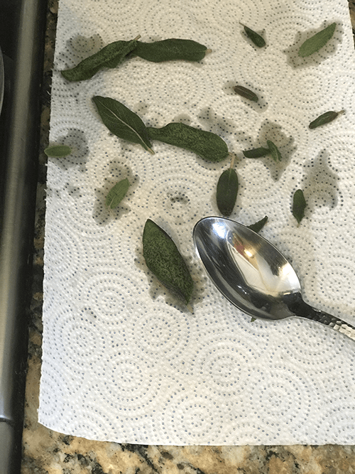 Drain the crispy sage on a paper towel.