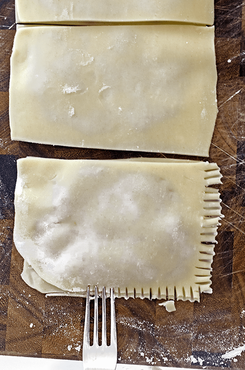 Use a fork to crimp the edges of pop tarts.