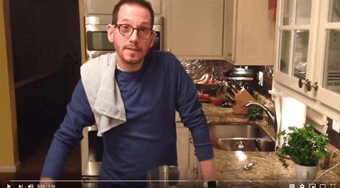 A man standing in a kitchen