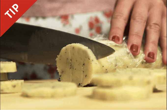 Slicing cookie dough with a knife