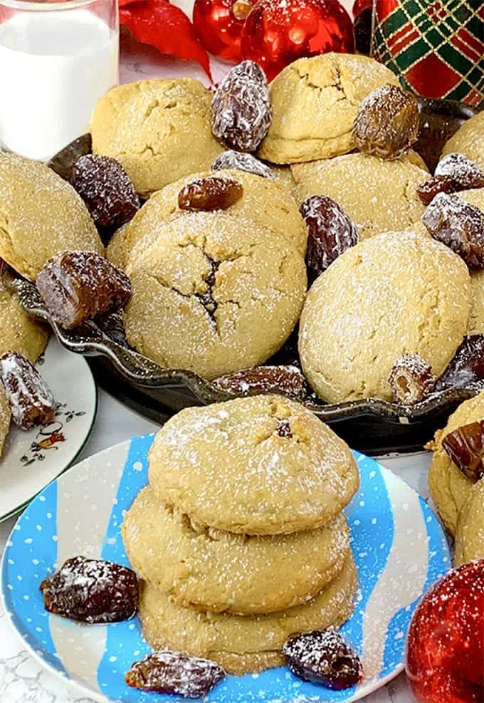 A plate of holiday cookies with dates