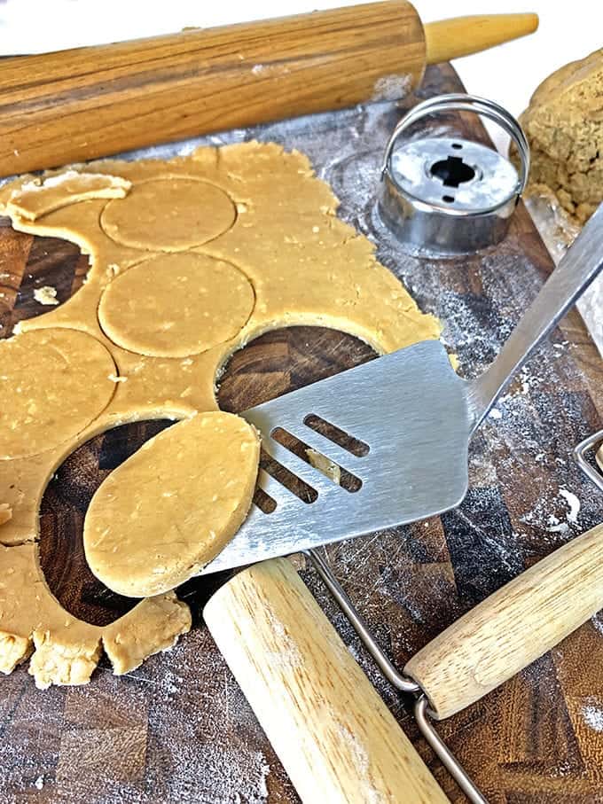 A wooden cutting board, with Cookie dough