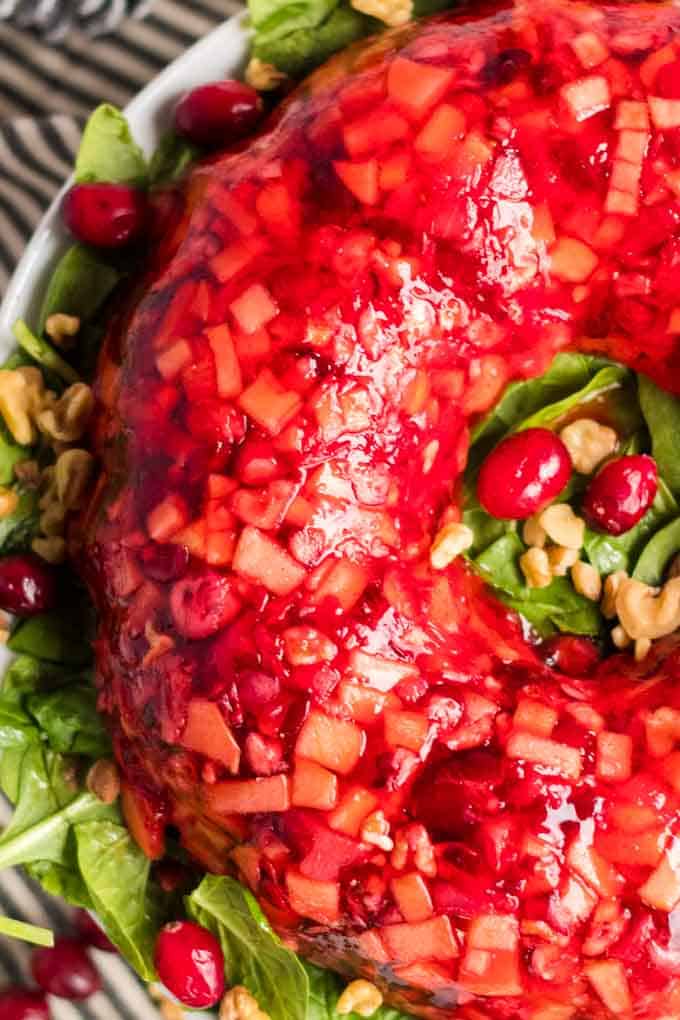 Holiday cranberry salad on a bed of greens.