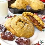 A plate of date-filled cookies with date garnishes.