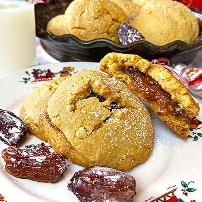 A plate of date-filled cookies with date garnishes.